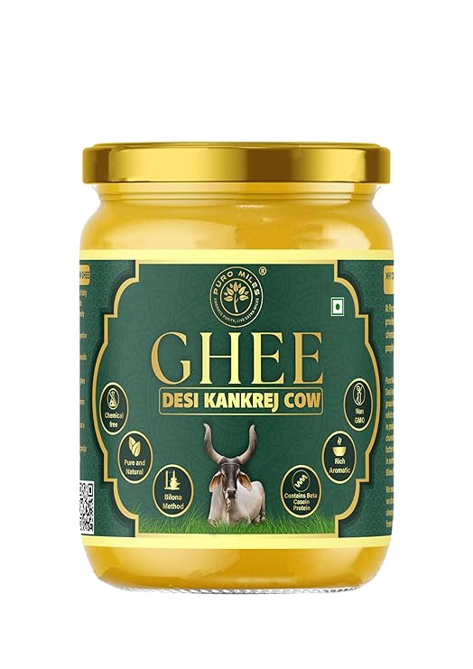 Jar of Ghee with green and gold label on a white background